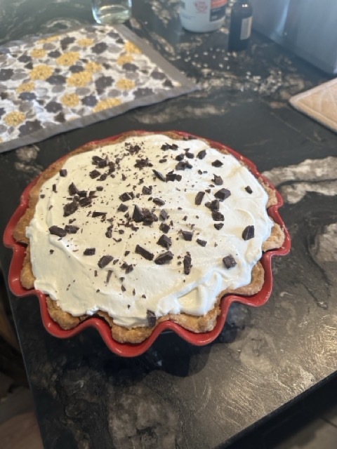 Homemade pie with whipped cream
